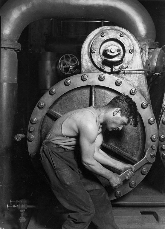 552px Lewis Hine Power house mechanic working on steam pump